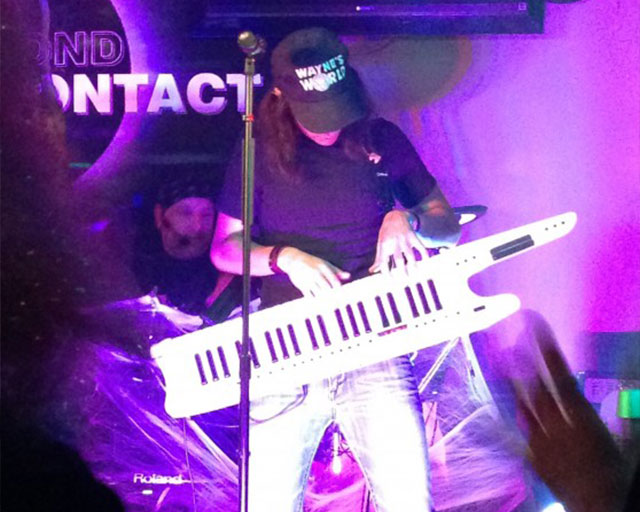 V.J. performing a Roland AX-7 keytar